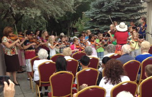 Picture of Strings in the Summer students performing July 23, 2013,
  at Sierra Place Senior Living.