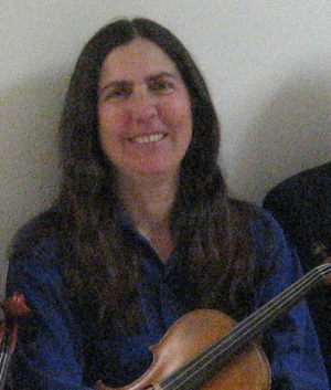 Photograph of Laura Gibson, conductor/leader.