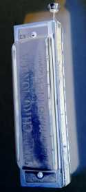 Photograph of blue harmonica