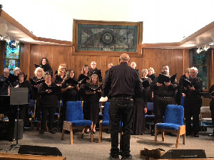 Photograph of Chamber Singers performing in First United Methodist Church last October