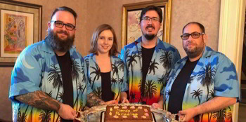Photograph of Nerds of Paradise with chocolate cake