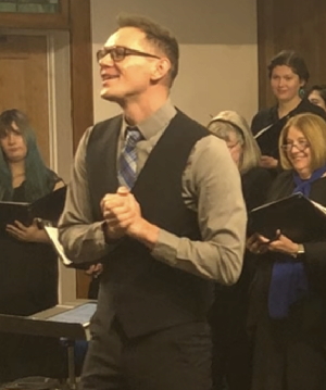Photograph of Jordan Gotchy addressing audience