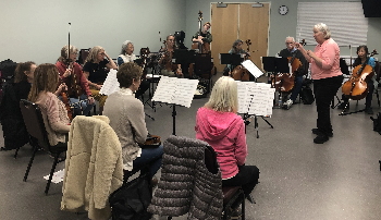 Photo of NQR in rehearsal, April 2026